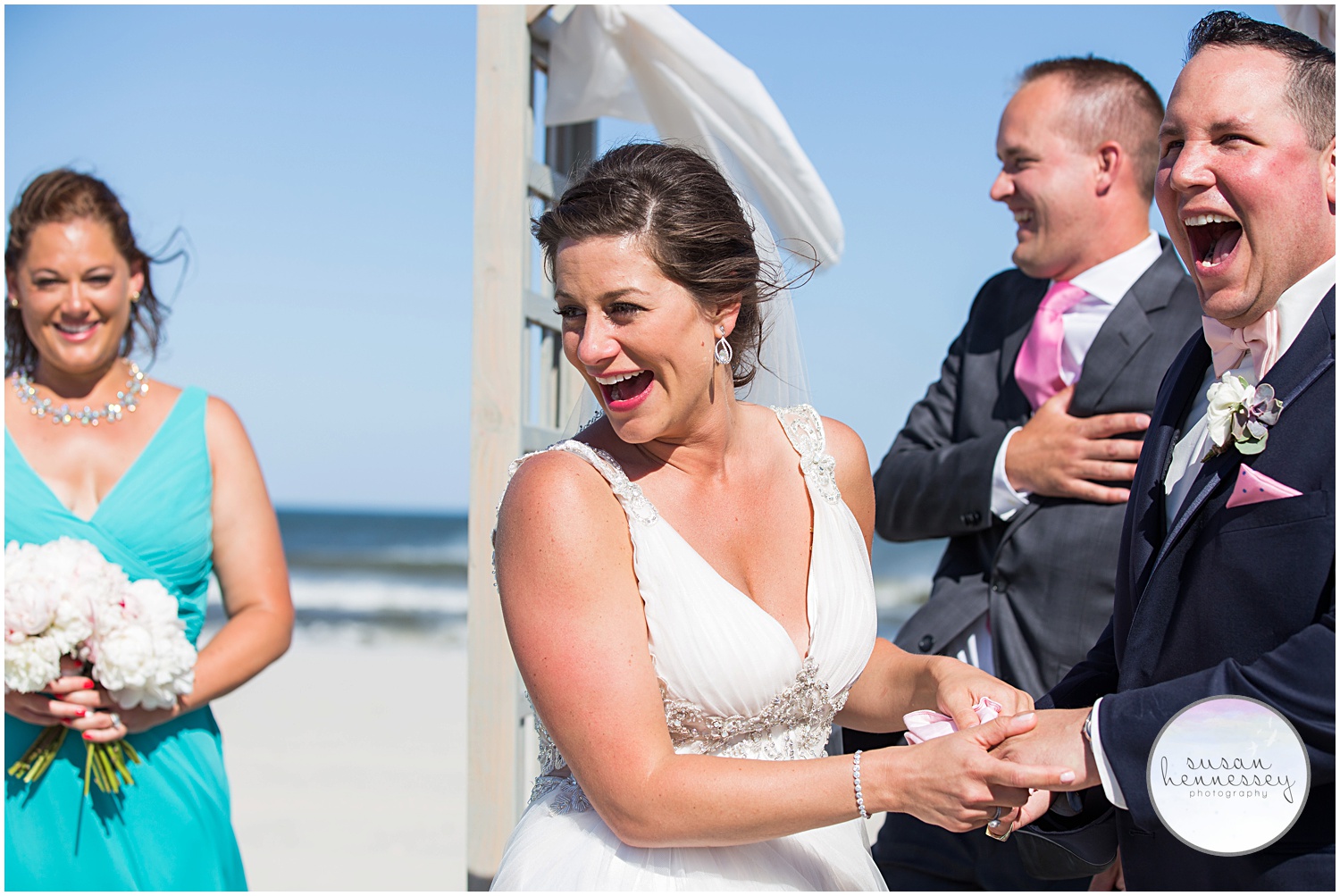 Couple laugh during beach ceremony