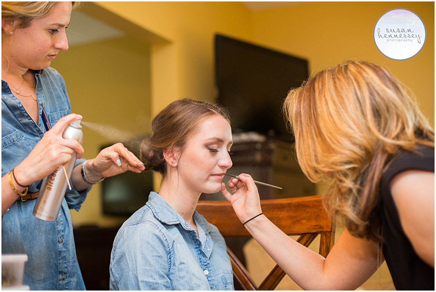 Final hair and makeup for bride getting ready at the Nassau Inn.