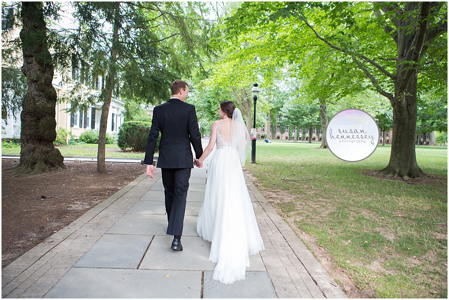 Bride and Groom walking on Princeton's campus. 
