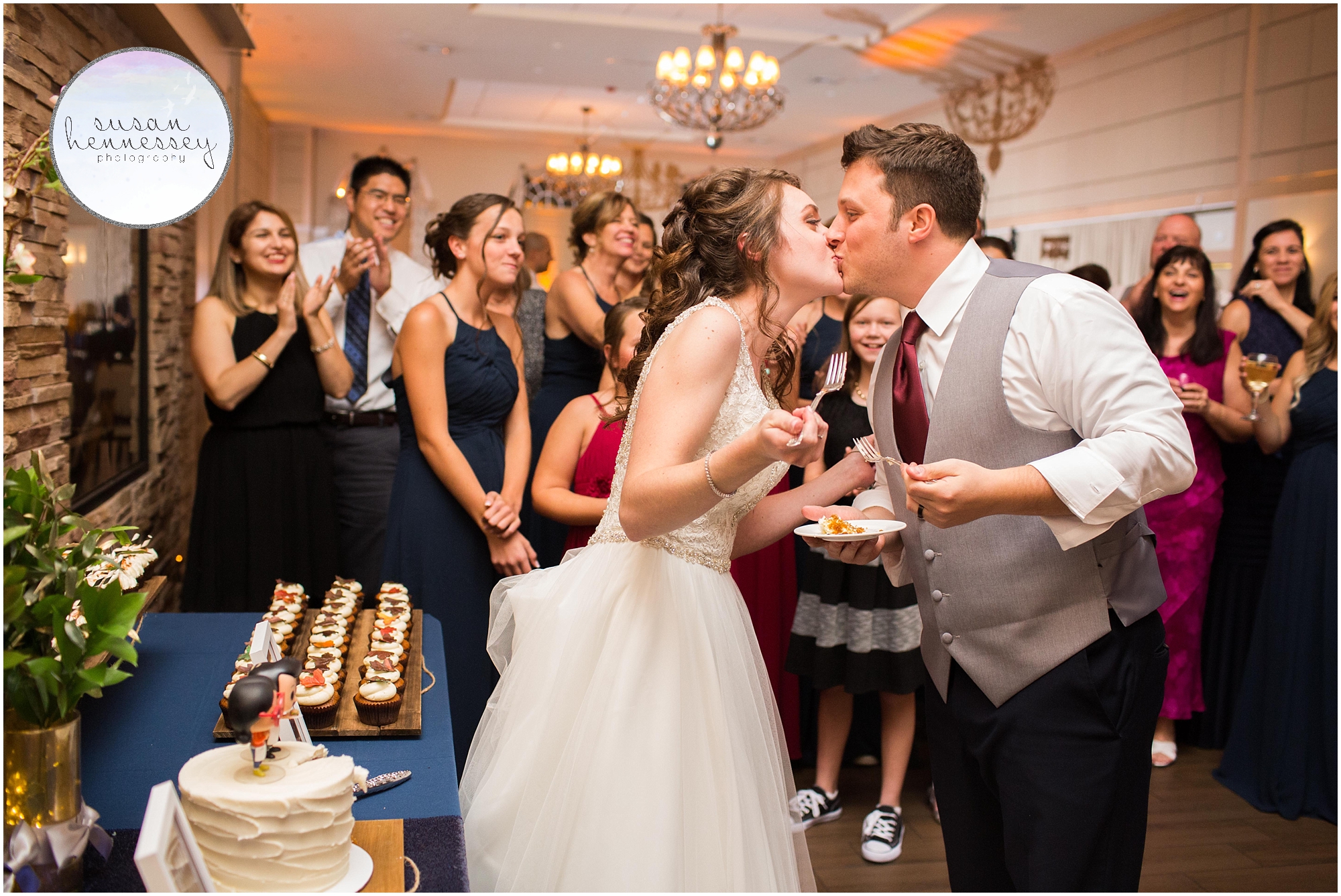 couple kisses after eating cake 
