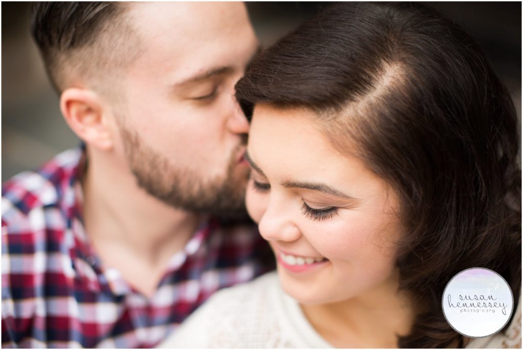 Close up of a future bride and groom at their engagement session. 