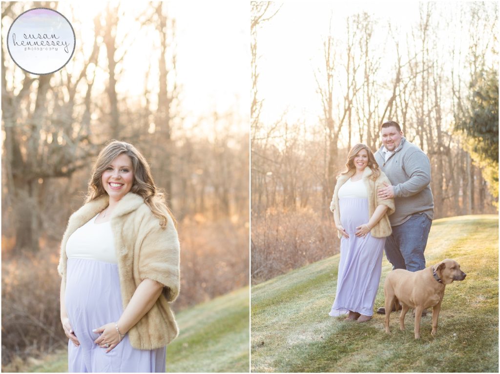 A portrait of a pregnant woman with her husband and dog.