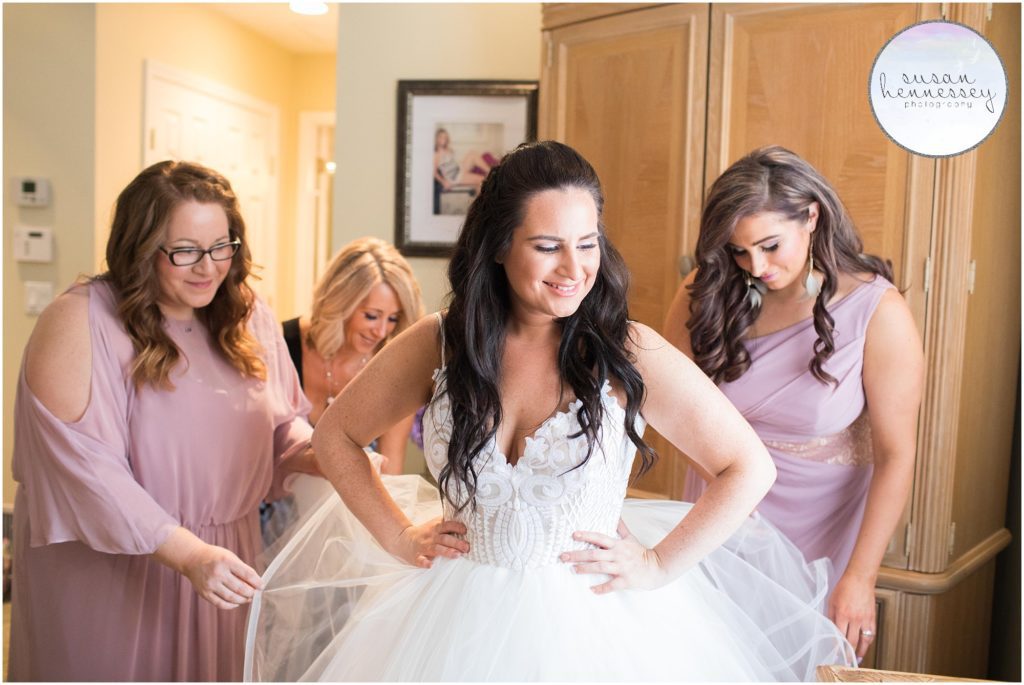 Bride gets dressed for her Watermill Caterers wedding