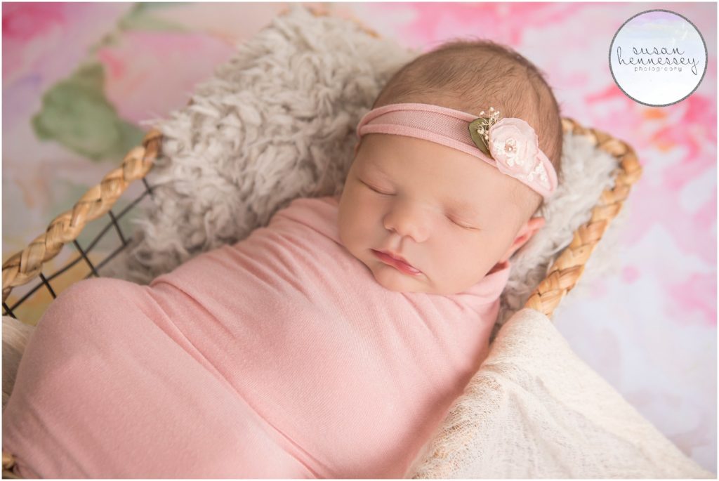 Studio photograph of baby girl in philadelphia newborn photography session.