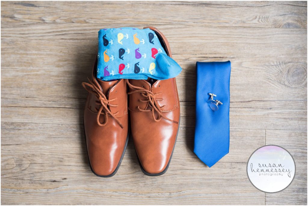 Groom details on the wedding day - shoes, socks, tie and cuff links.