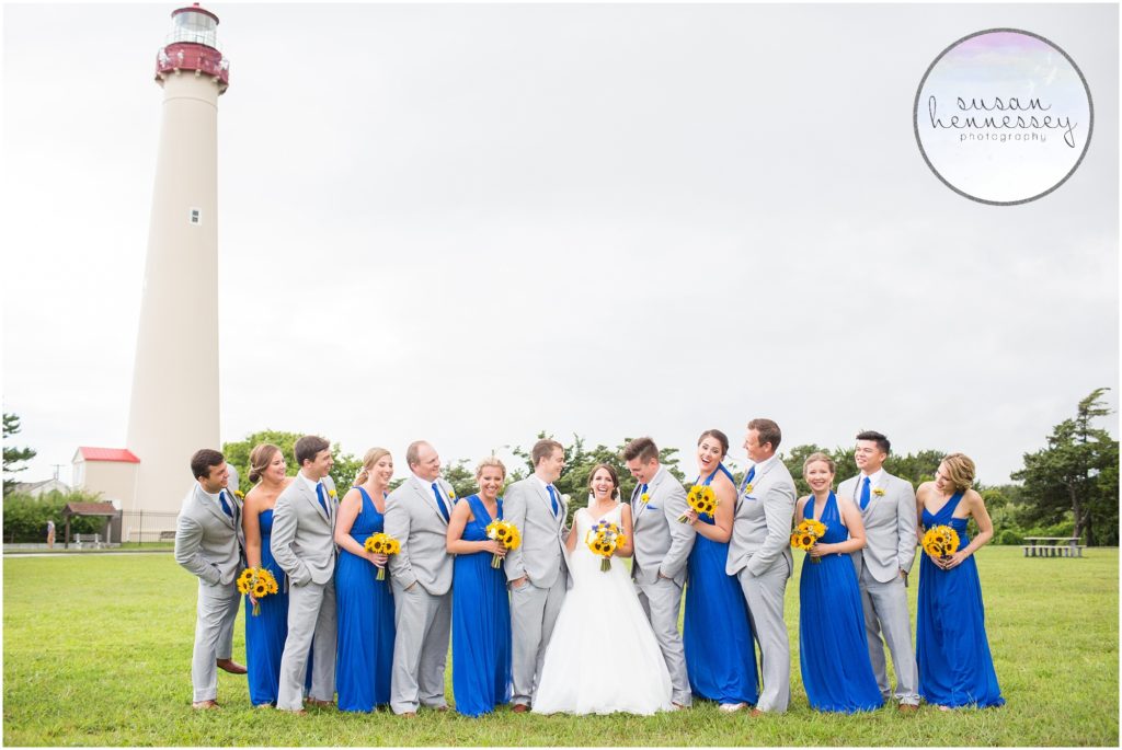 Bridal party in blue and gray at Cape May lighthouse.