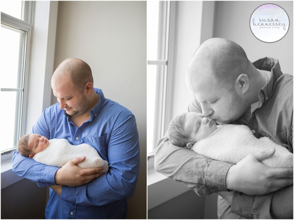 A father holds his son during his South Jersey Newborn Photography session