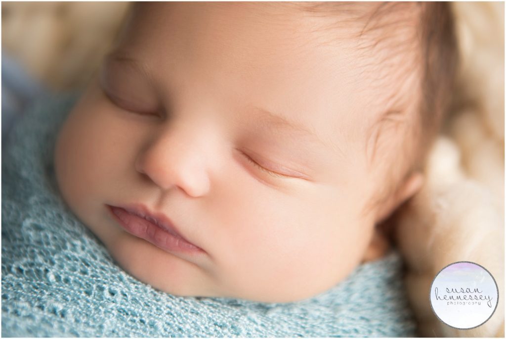 Close up of newborn baby boy's facial features