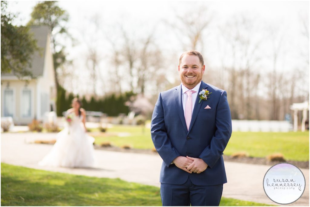 Bride and groom have first look at Running Deer Golf Club wedding.
