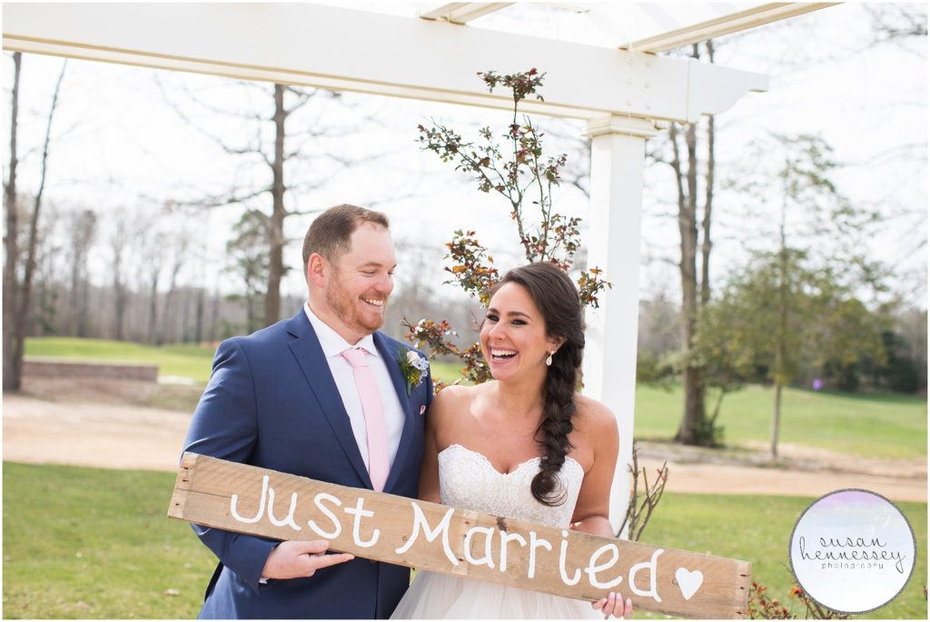 couple holding "Just Married" sign