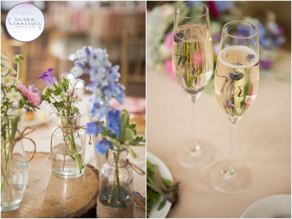 Detail of centerpeices and bride and groom champagne glasses