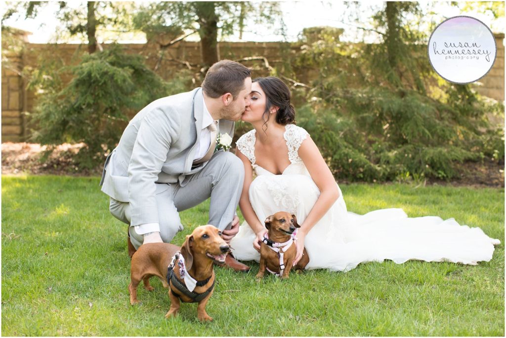 bride and groom include their dachsund dogs in their wedding portraits at Scotland Run