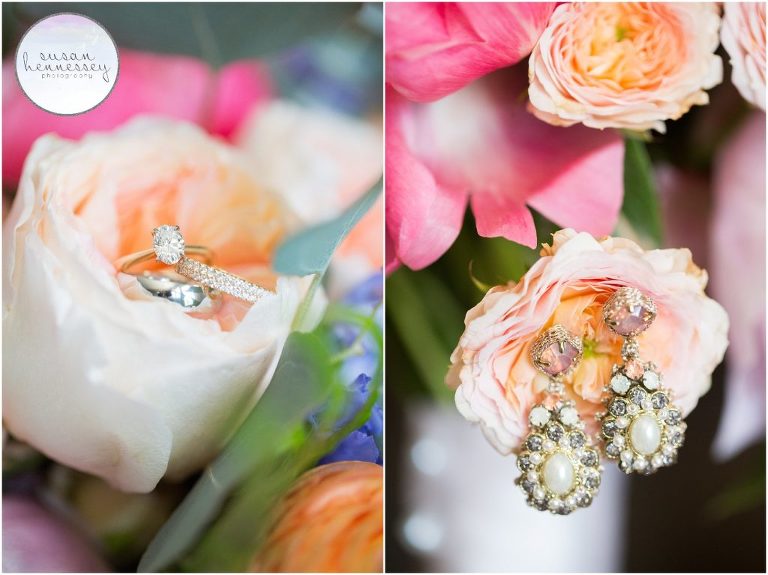 Bride's earrings and wedding bands in spring bouquet