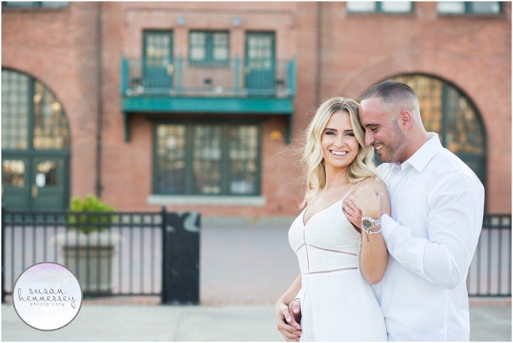Couple laugh at their engagement session