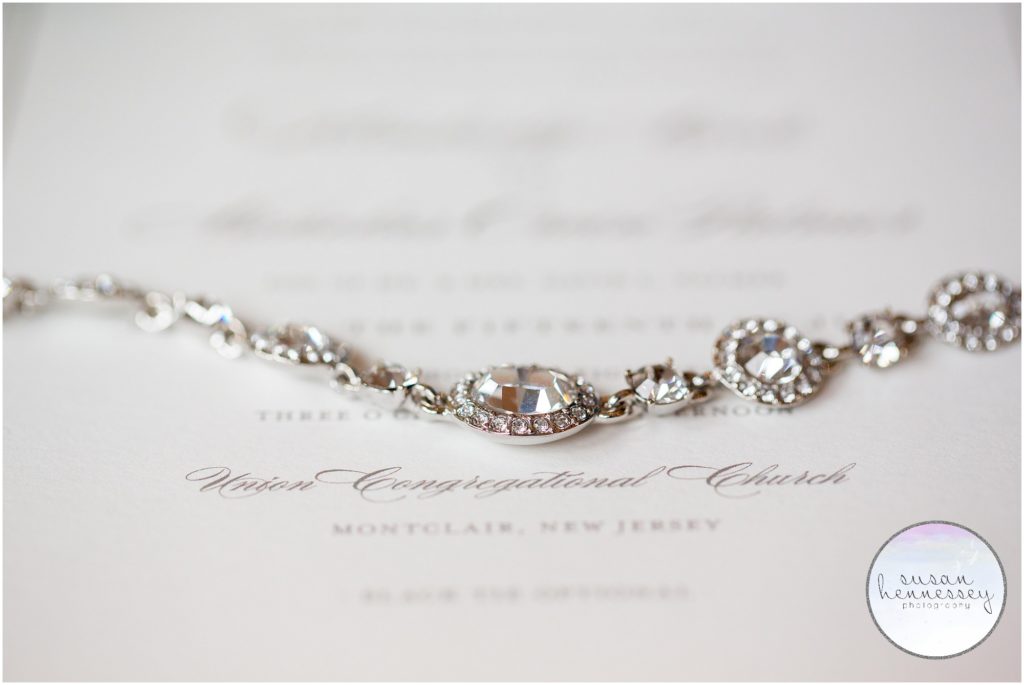 Bride's bracelet and wedding invitation for Pleasantdale Chateau Wedding