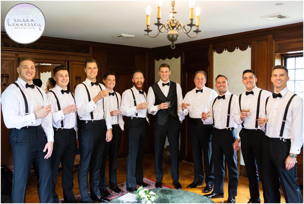 Groom and groomsmen in groom suite at Pleasantdale Chateau Wedding