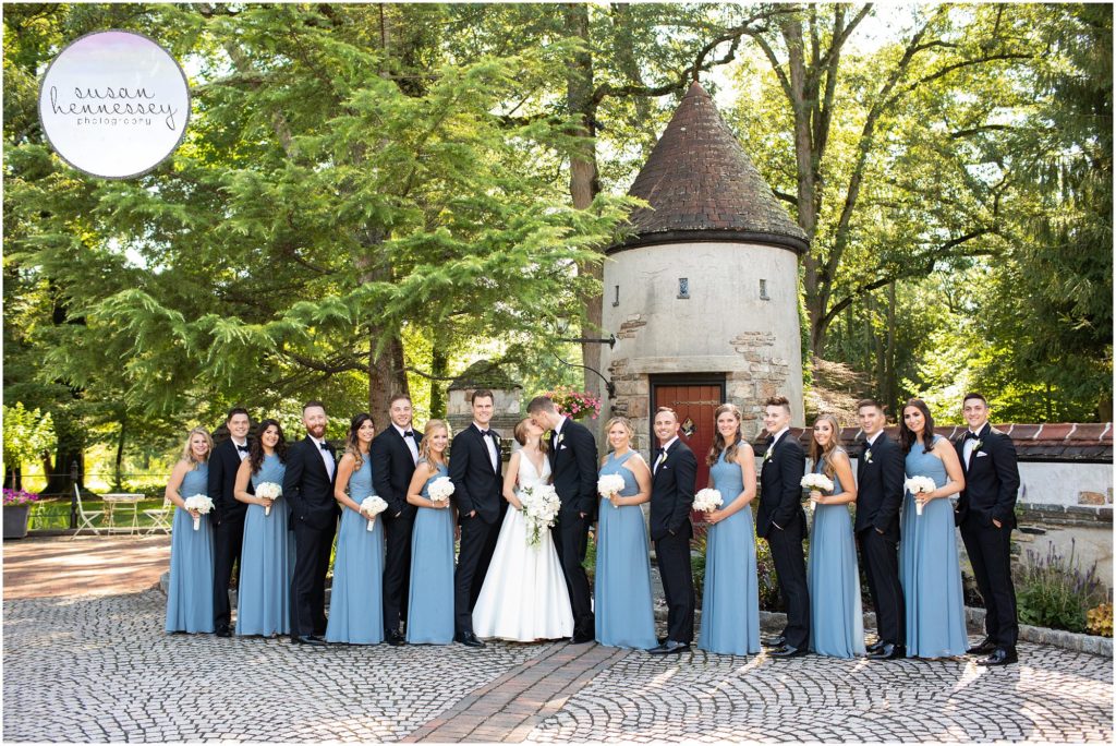 Bride and groom and their bridal party on their wedding day at pleasantdale chateau