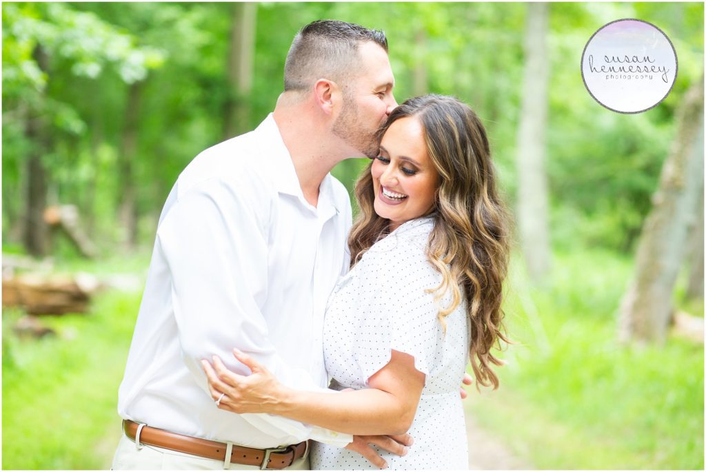 A happy couple have their engagement photos at Allaire State Park