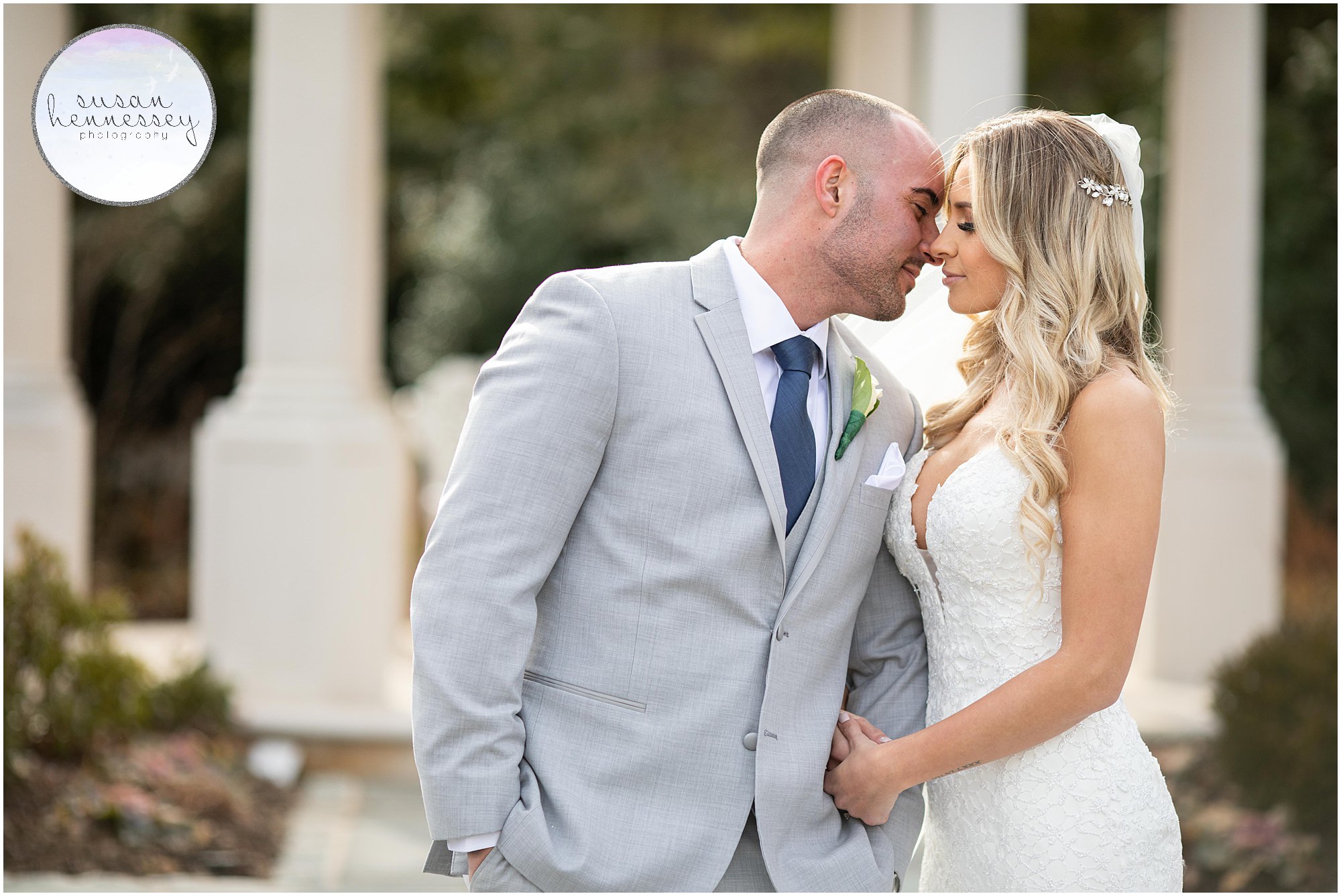 groom leans in for kiss from bride 