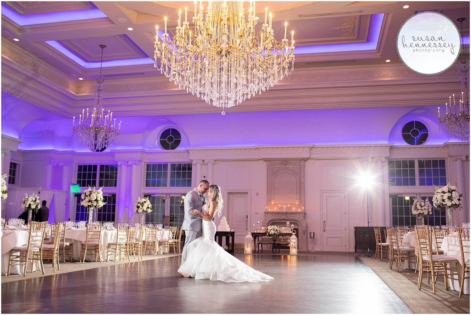 Romantic photo of bride and groom on dance floor.
