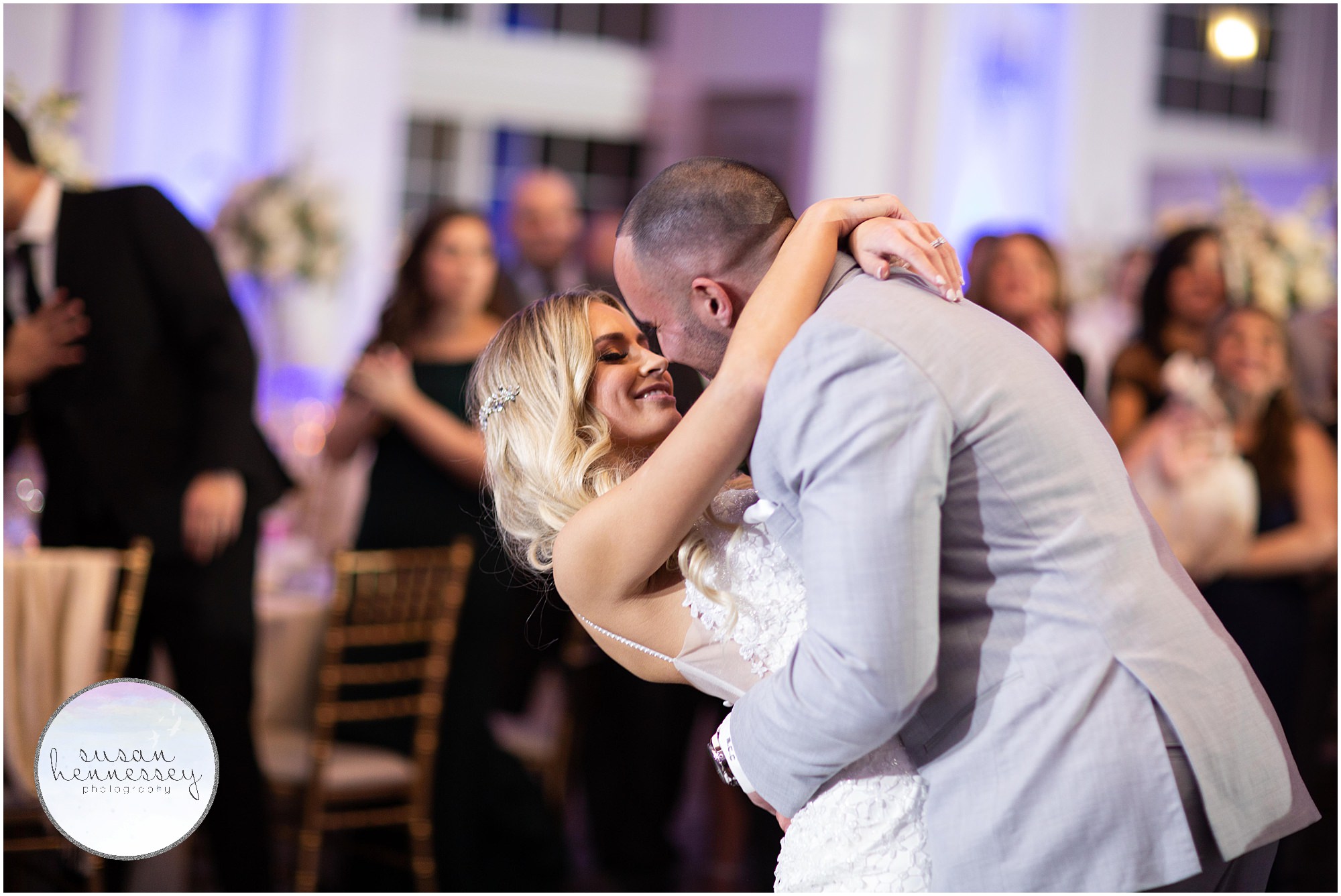 A bride and groom share their first dance 