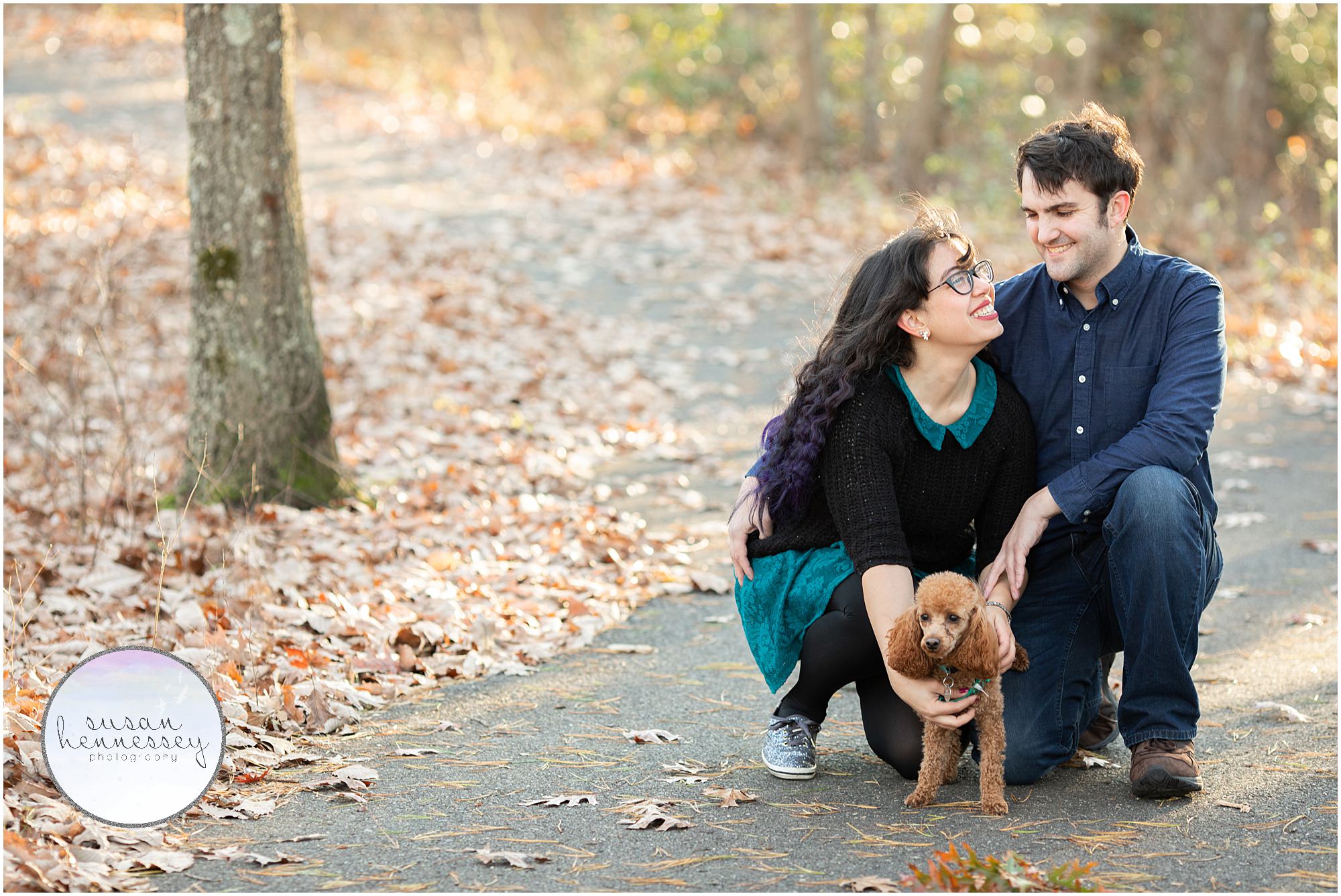 Couple pose with their dog at their Blueberry Hill Engagement Session