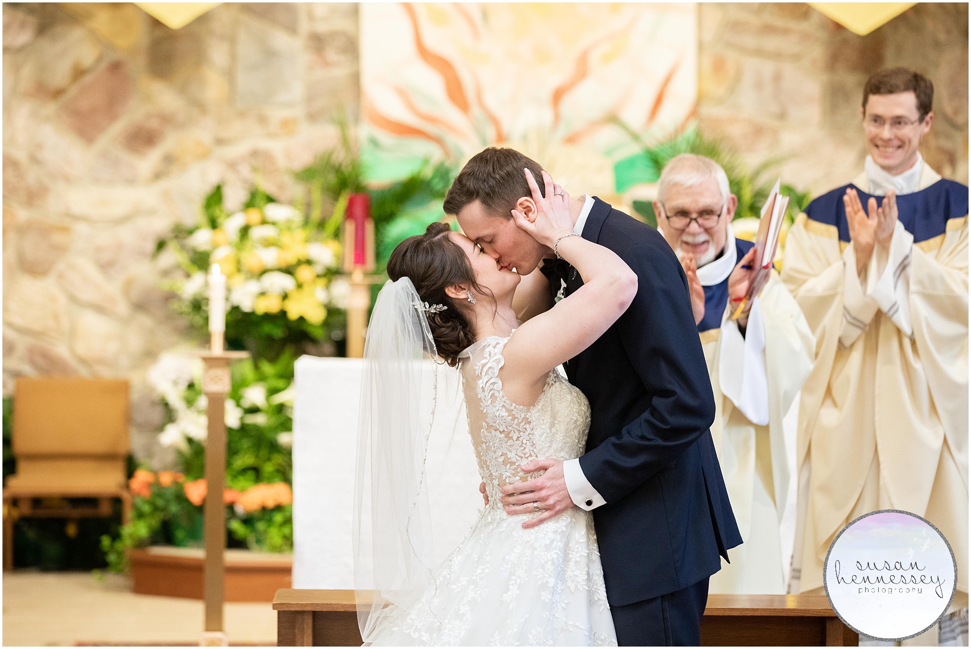 Bride and groom kiss for first time as husband and wife!