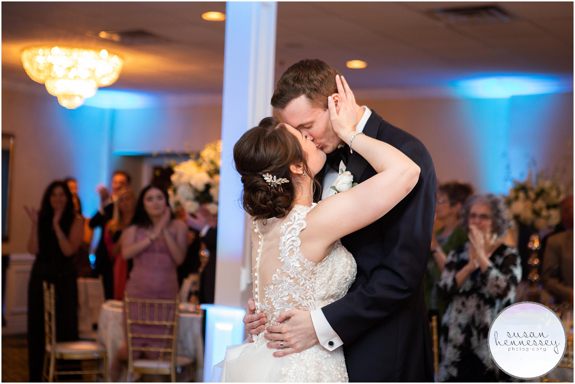 Bride and groom kiss during their first dance