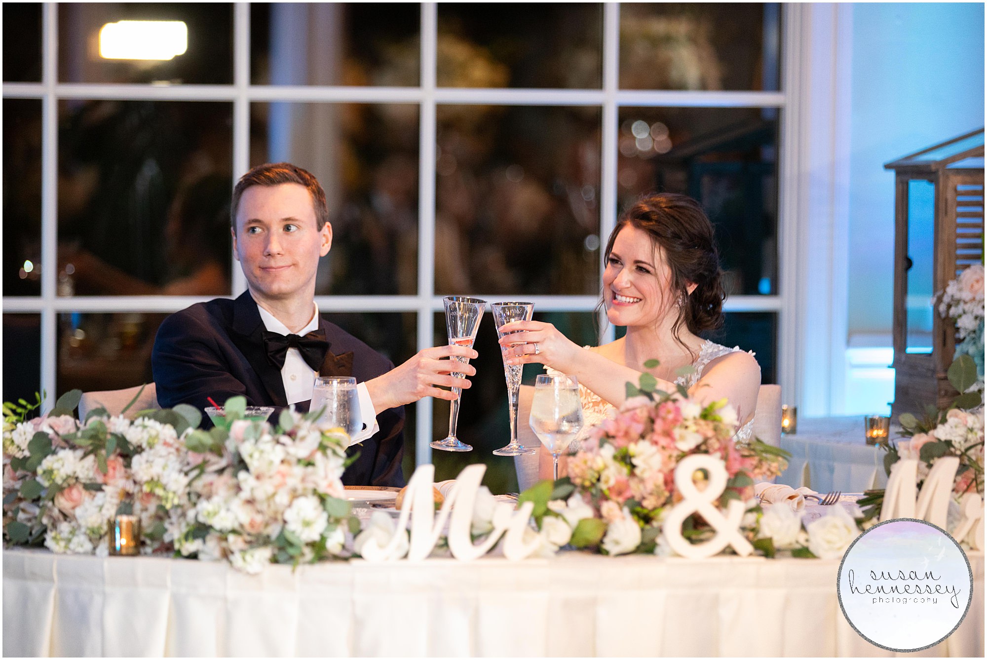 Bride and groom toast at their reception.