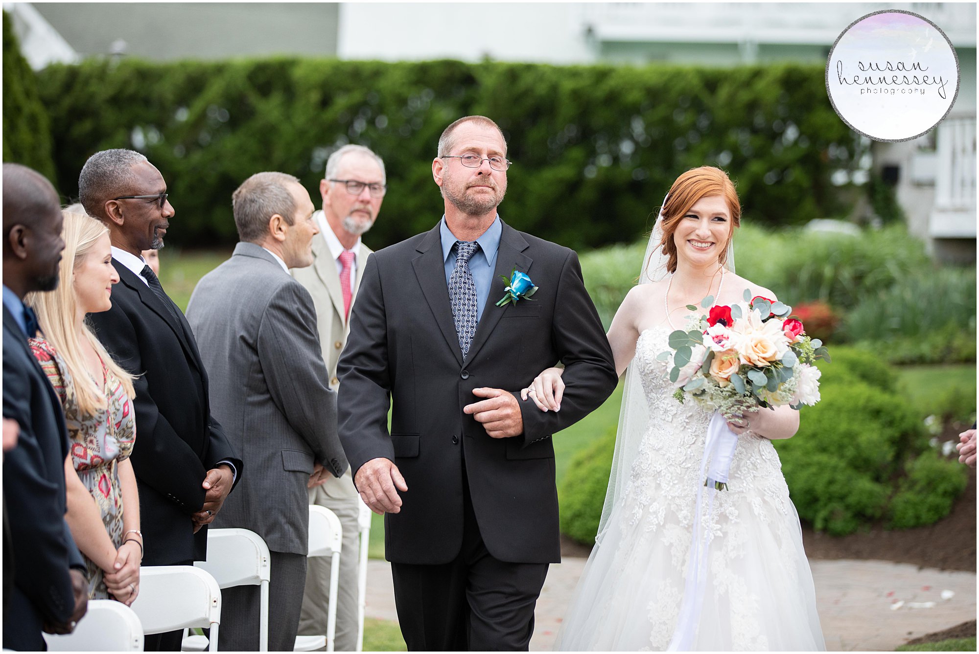 A bride walking down the aisle with her father