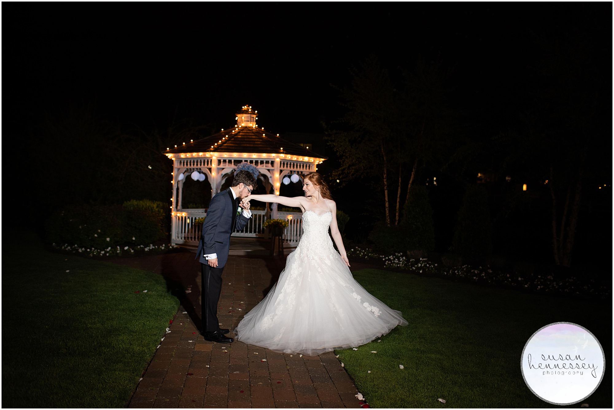 A romantic night portrait of a bride and groom on their wedding day at Greate Bay Country Club. 