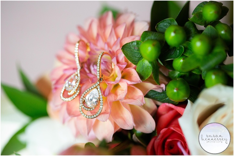 Bride's earrings on bridal bouquet. 