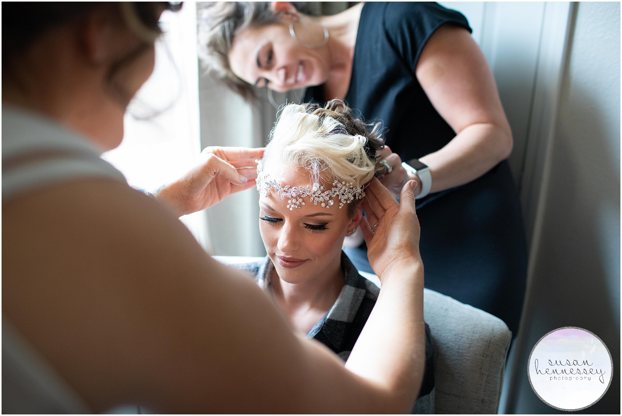 bride getting her hairpiece put in