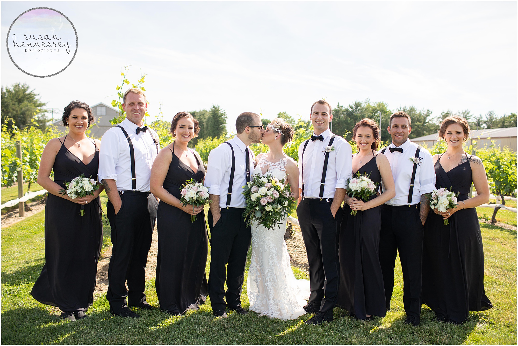 Bridal party in the vineyard at Tomasello Winery