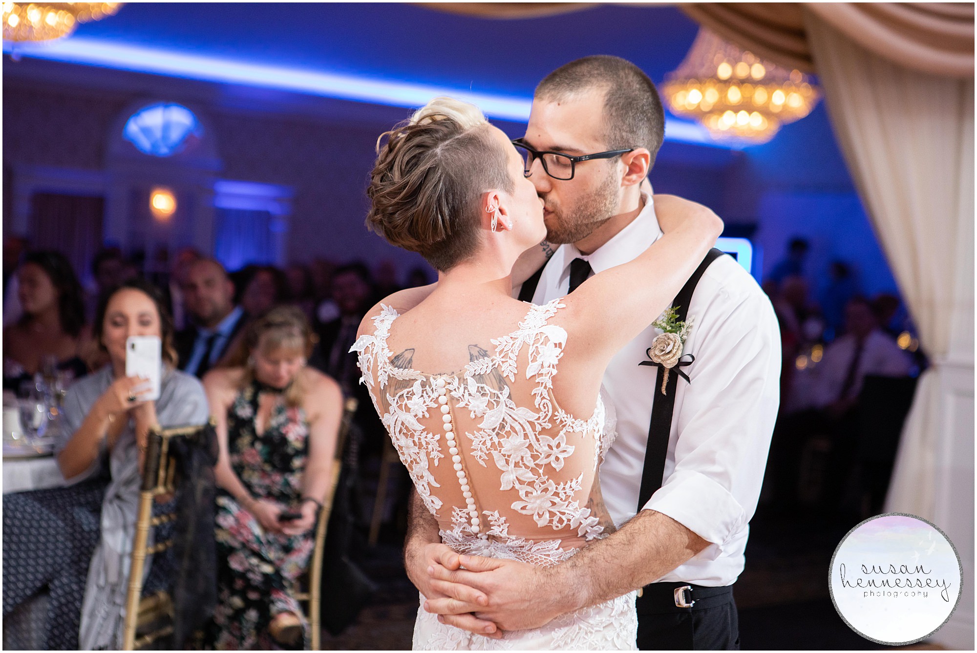 bride and groom kiss during dance