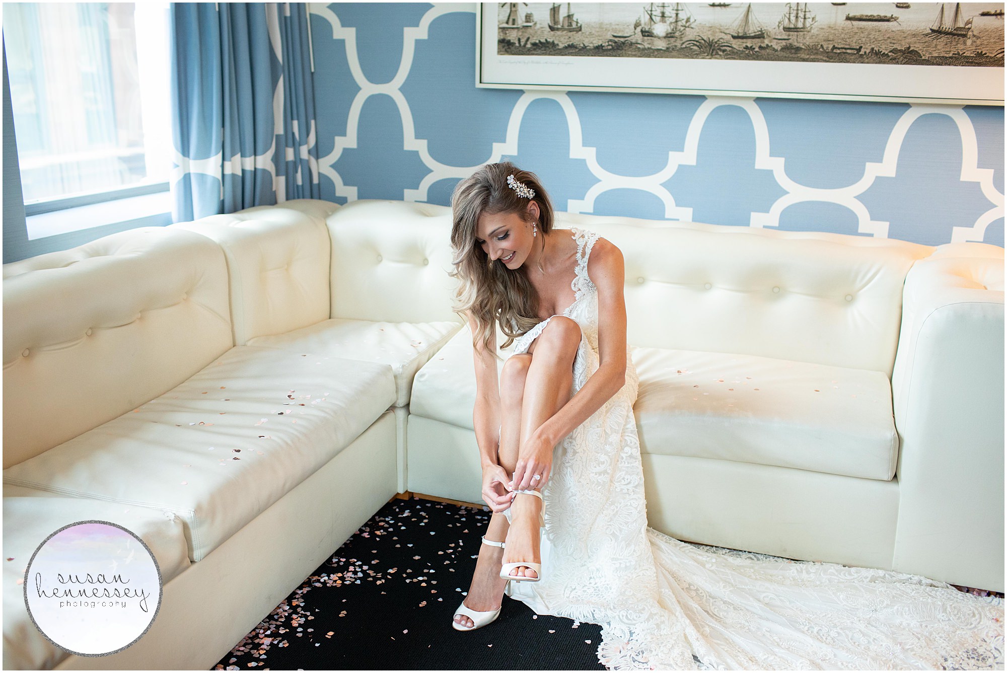 Bride puts on her Kate Spade bridal shoes.