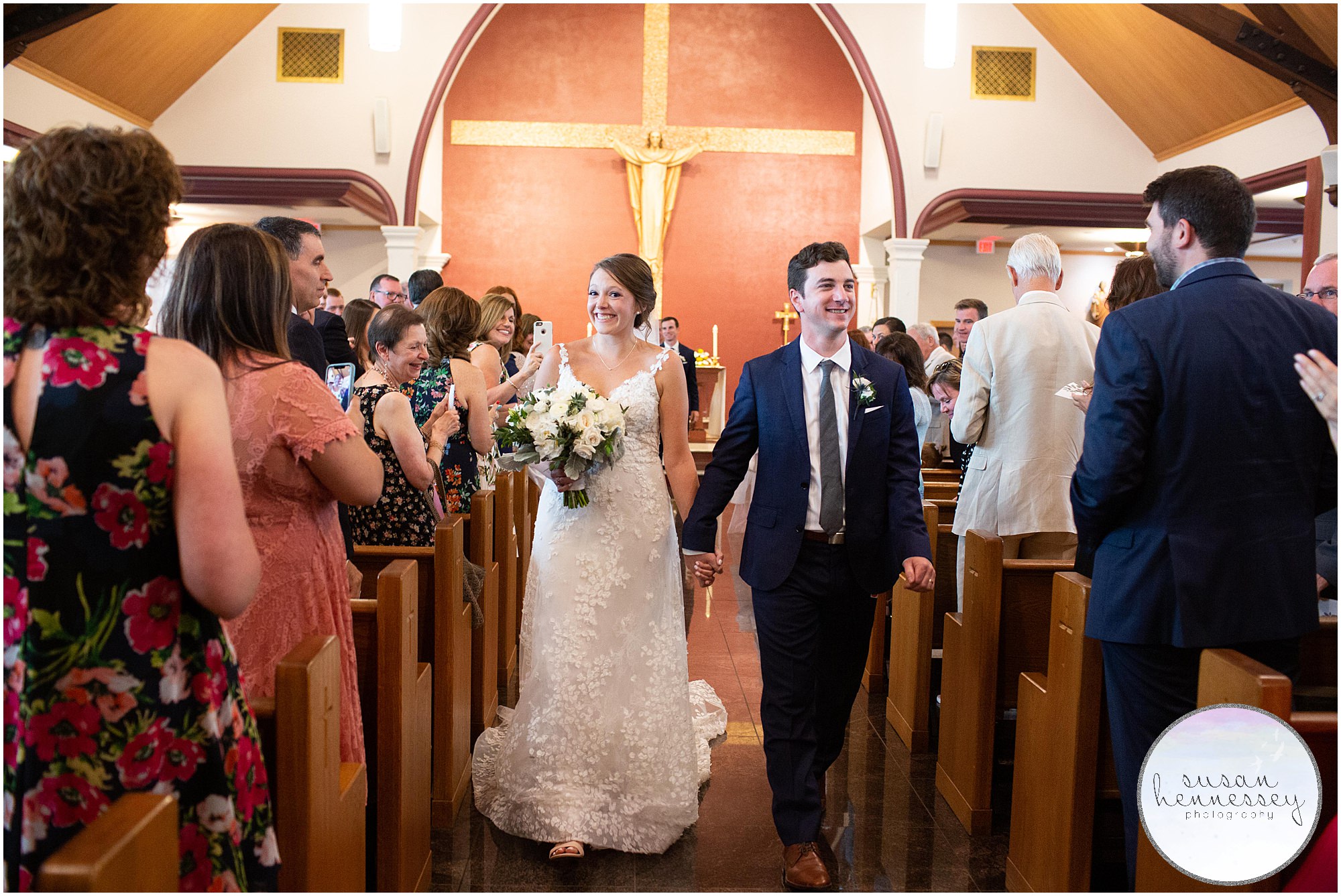 Bride and groom are officially married at Catholic wedding in Hamilton, NJ