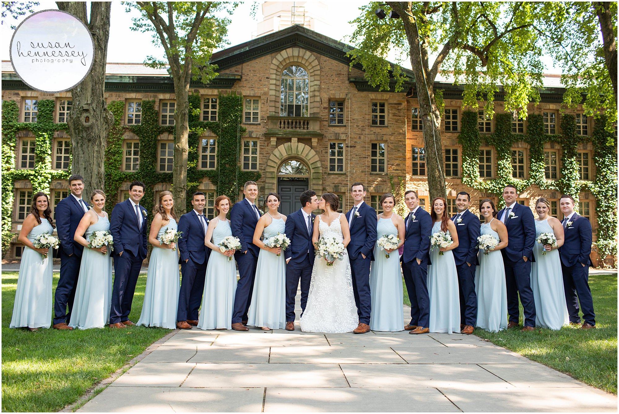 Bridal party in light blue and navy at Forsgate Country Club wedding.