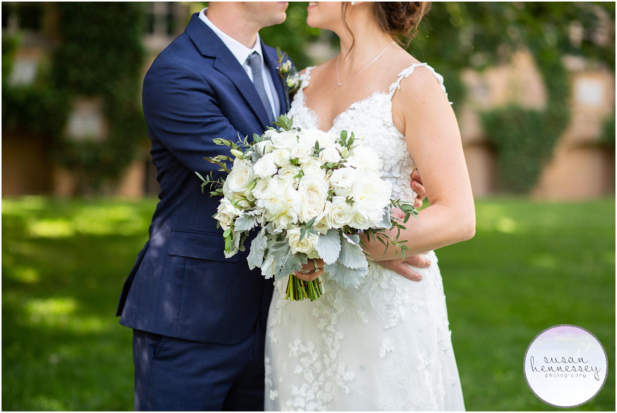 A bridal bouquet filled with white flowers.