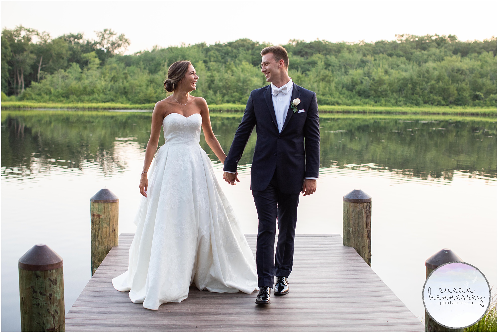 Bride and groom portraits on lake in Central Jersey