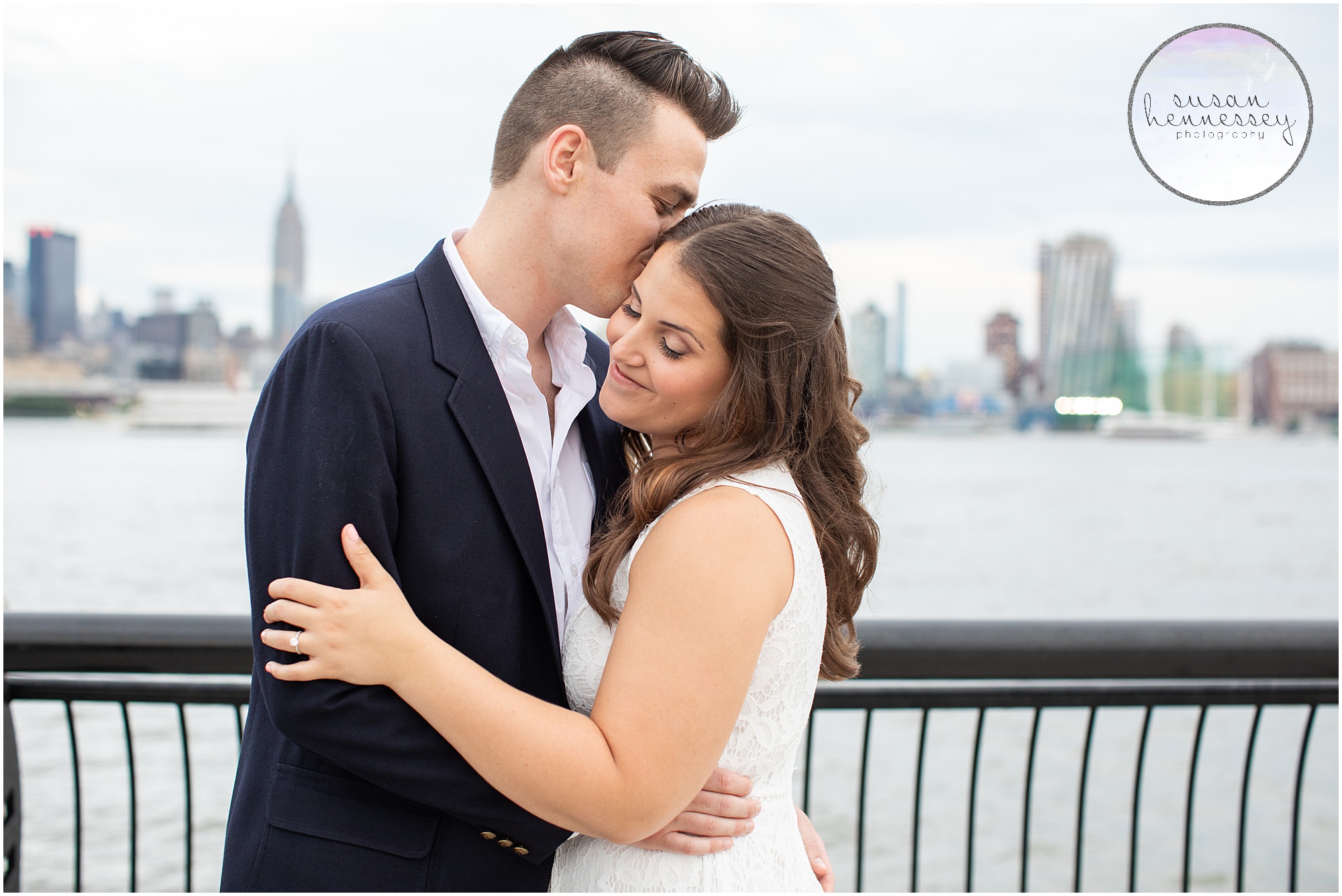 An engaged couple on the Hoboken waterfront