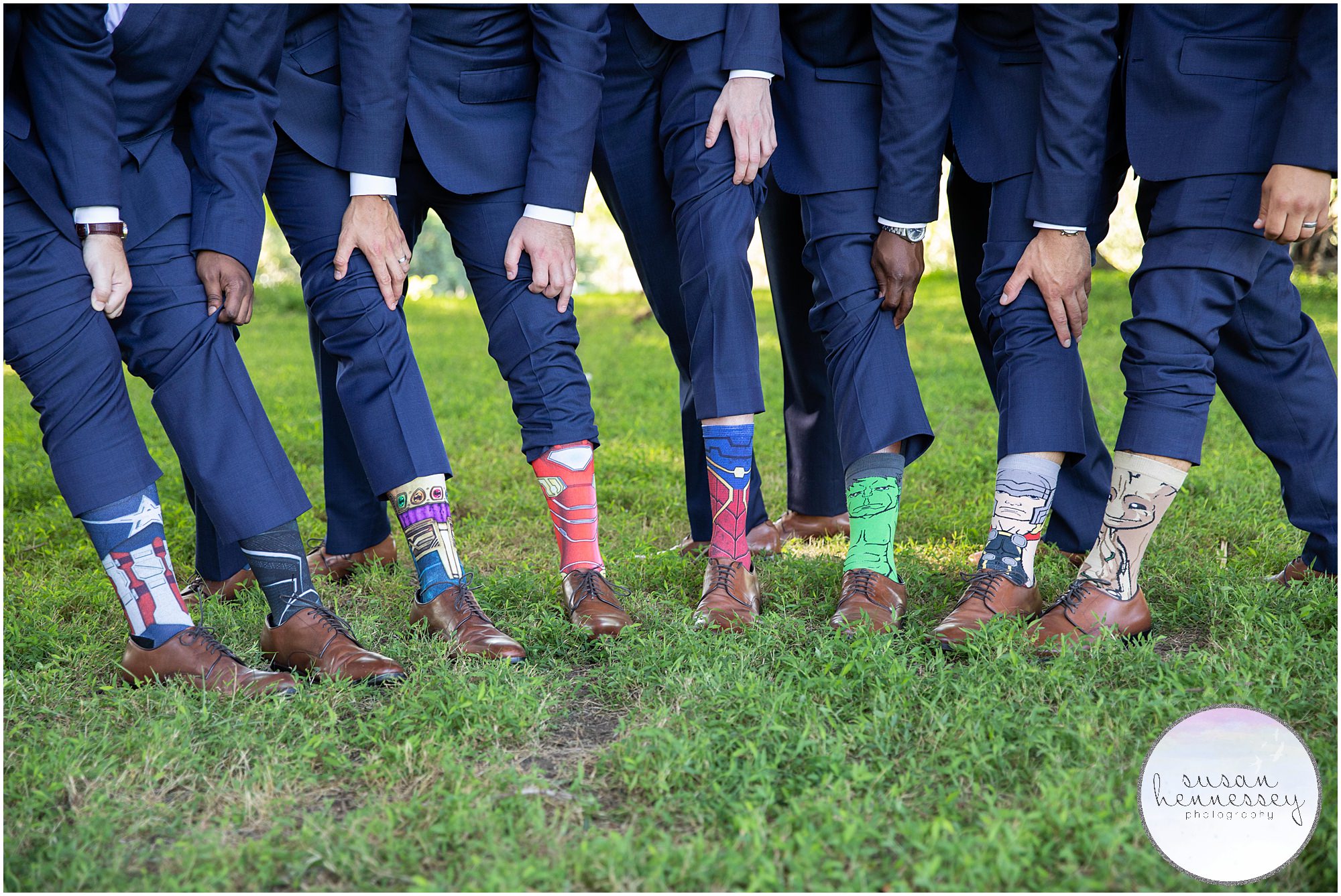 Groom and groomsmen and super hero socks.