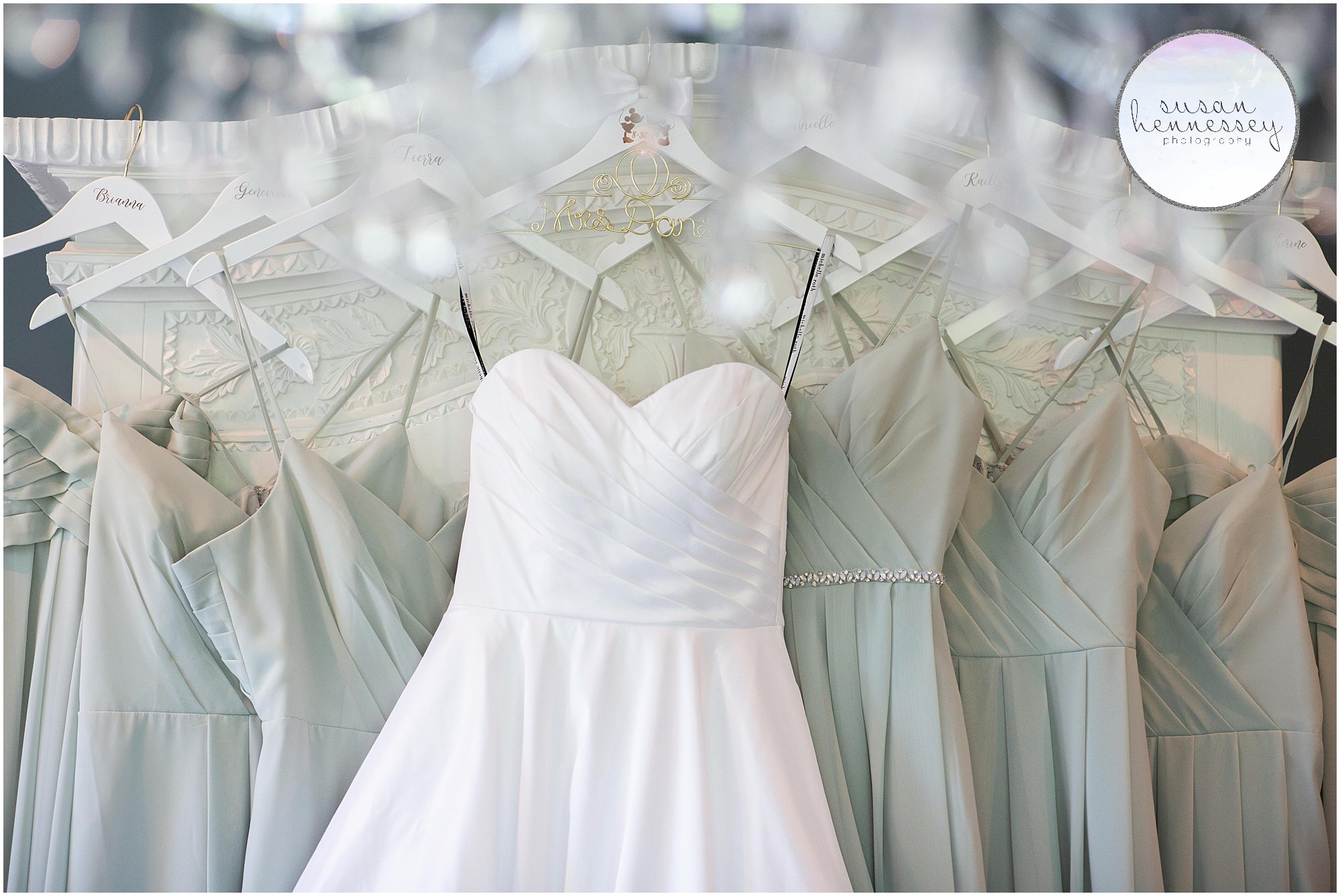 Bridal gown and bridesmaid dresses hanging