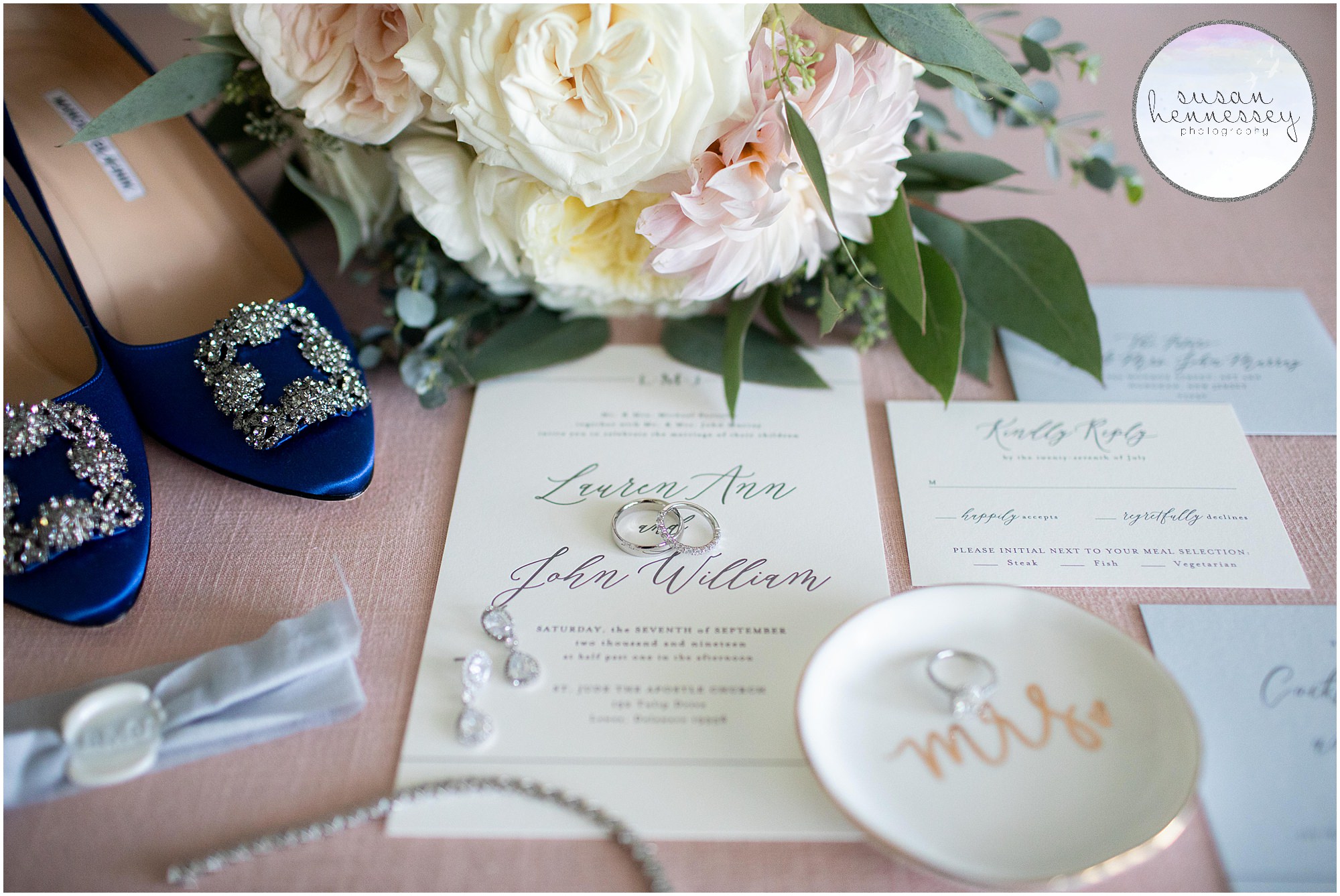 Bridal details featuring the bride's bouquet, invitation, wedding bands and blue manolo blahnik shoes.