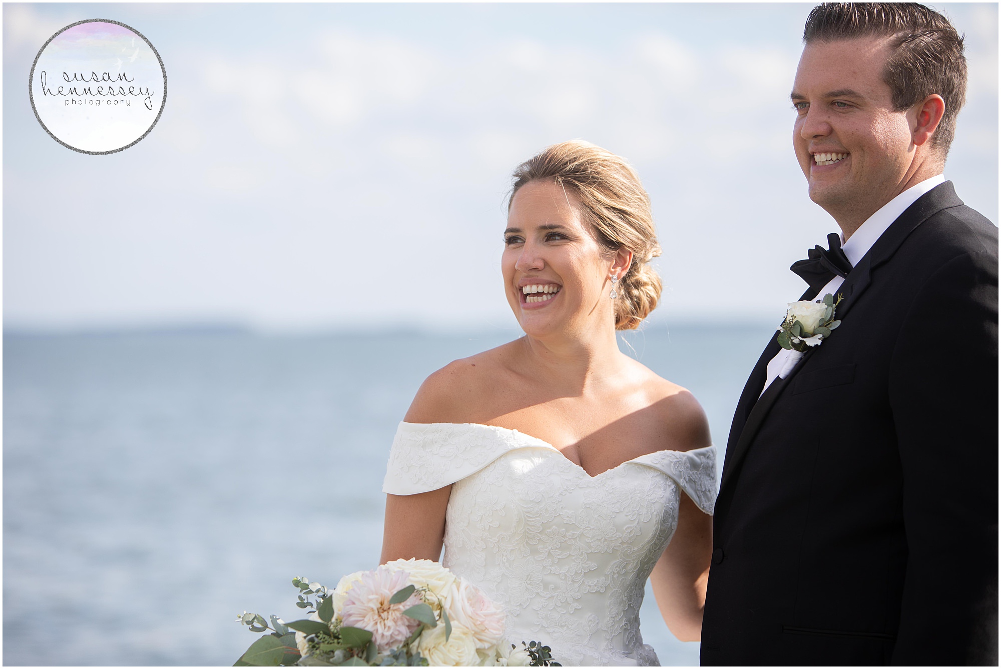 Bride and groom laugh on their wedding day
