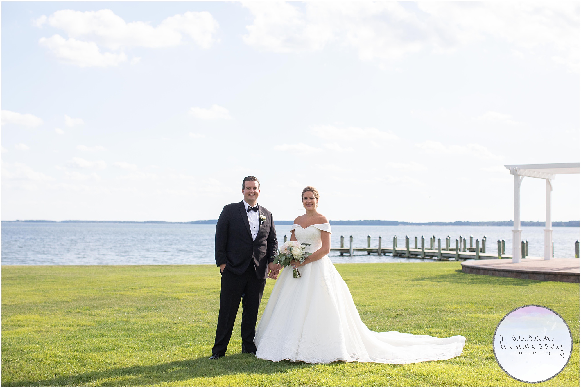 A bride and groom on oceanfront golf course in Rehoboth Beach