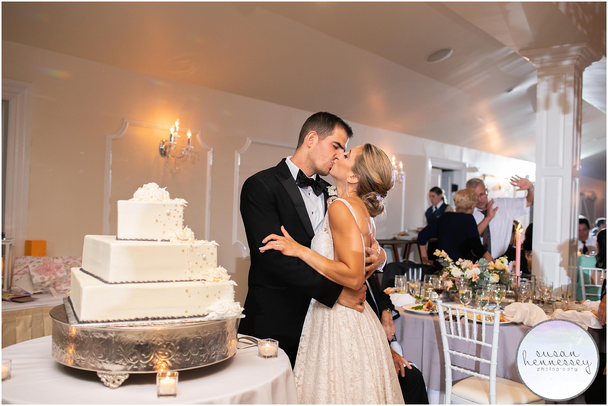 Couple cuts their cake at Jersey Shore wedding reception.
