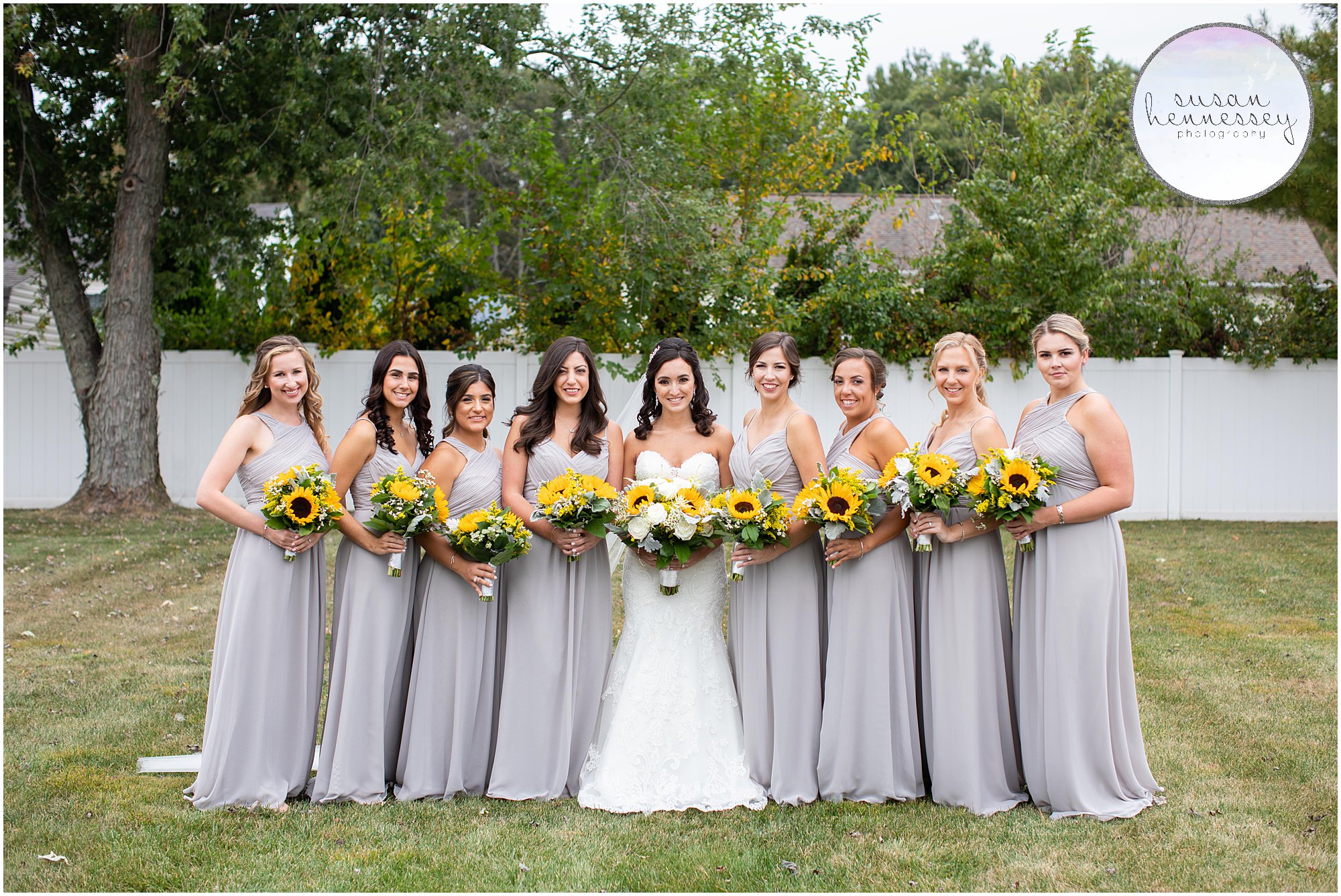 Bride and bridesmaids pose before ceremony