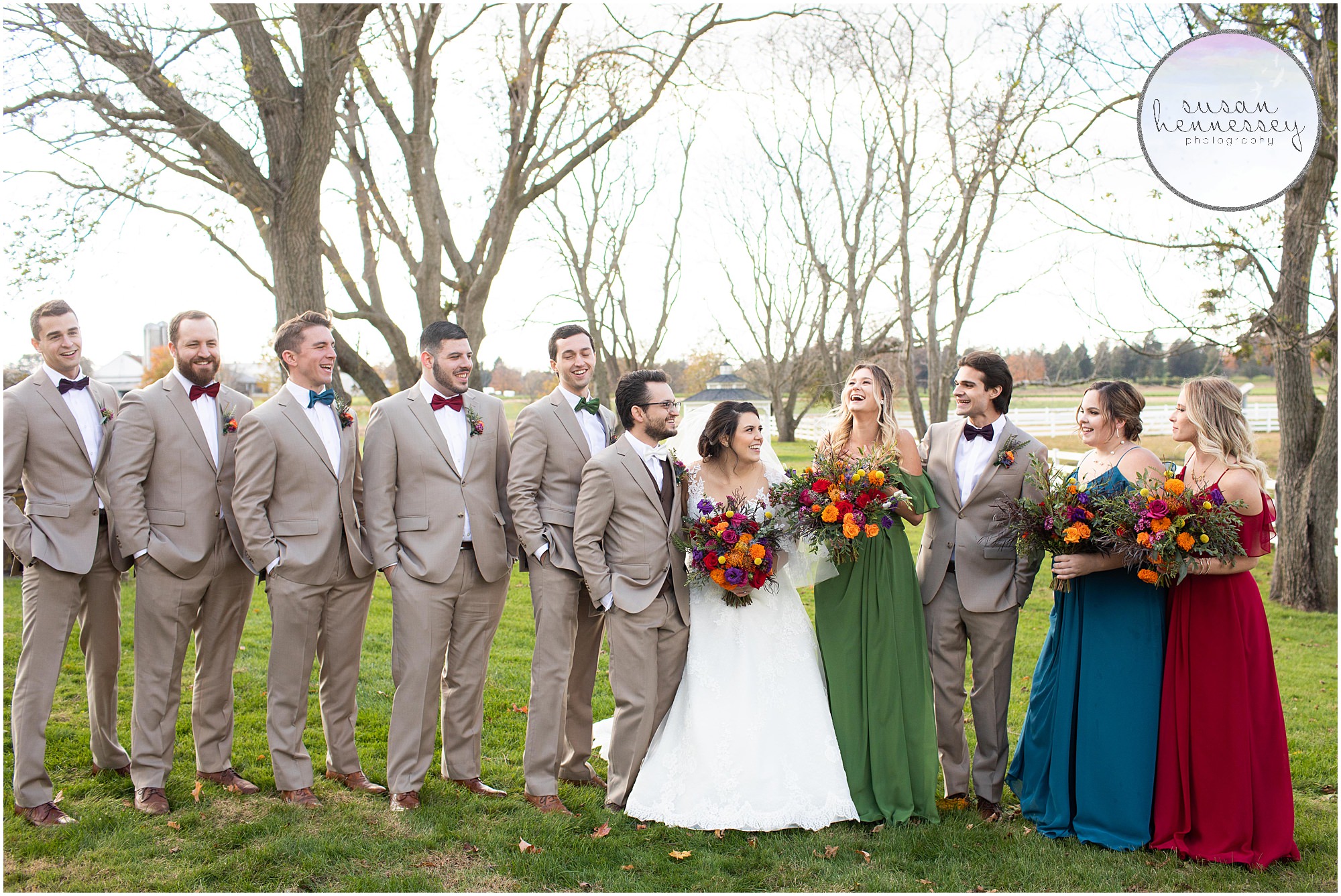 Bridal party with fall colors at Barn at Silverstone wedding
