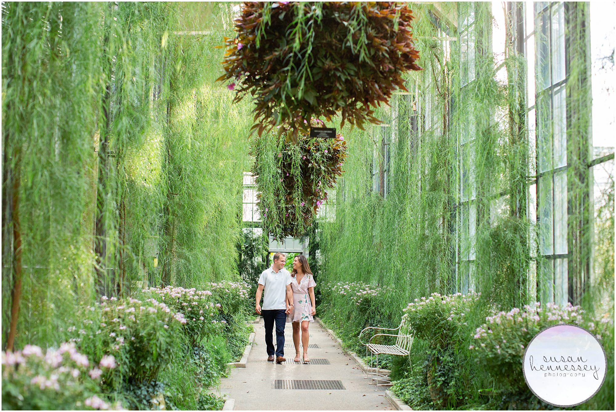 A couple walks together at Longwood Gardens